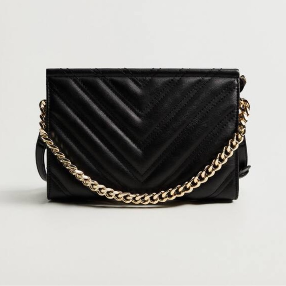 Faux leather cross body bag with chain detail from Mango